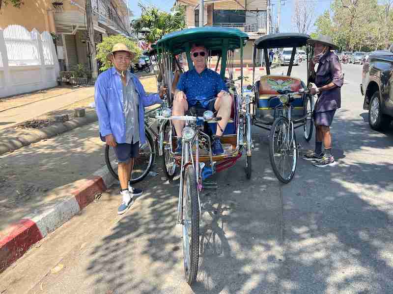 Man in bicycle taxi